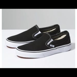 black vans slightly worn